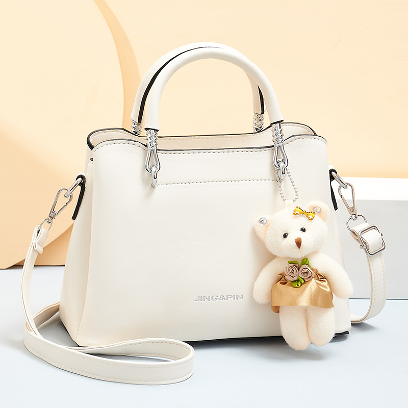 Fashion handbag women 2025 new casual women's shoulder bag large capacity soft leather multi-layer teddy bear pendant women's bag