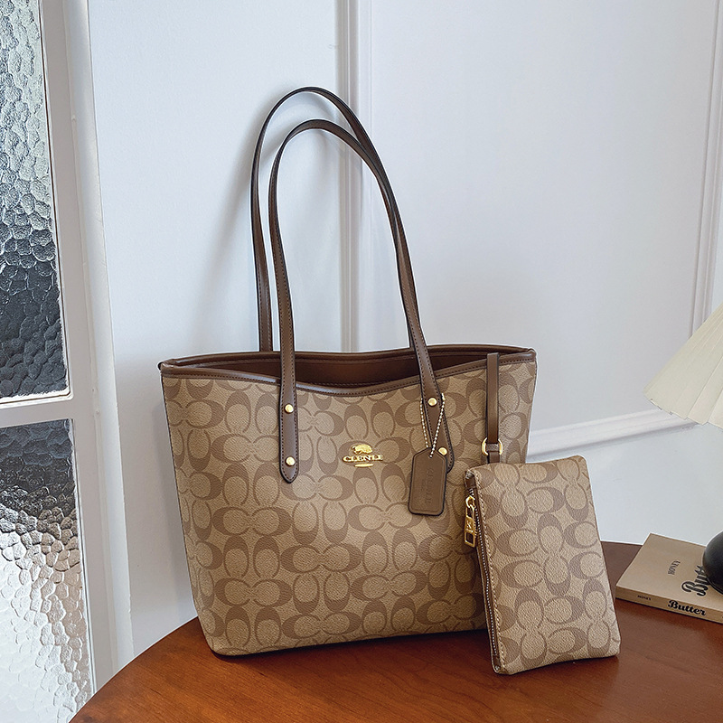 2025 Four Seasons New Handheld Large Capacity Tote Bag One Shoulder Versatile Fashion Printed Shopping Bag Wind Women's Bag Travel