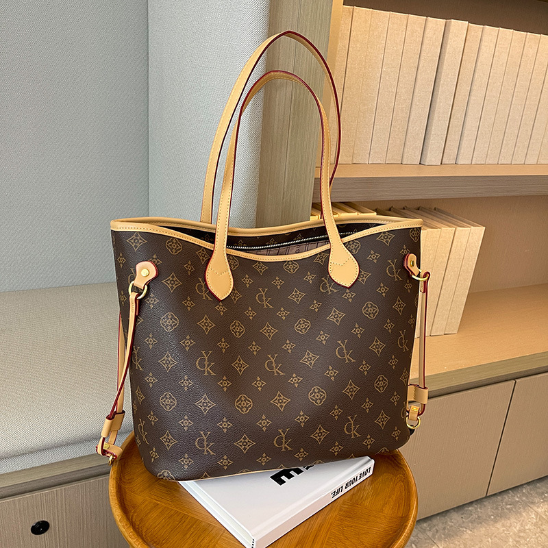 Autumn and Winter Women's Bag 2025 New Handheld Old Flower Tote Bag, niche design, high-end sense, large capacity commuting shoulder bag