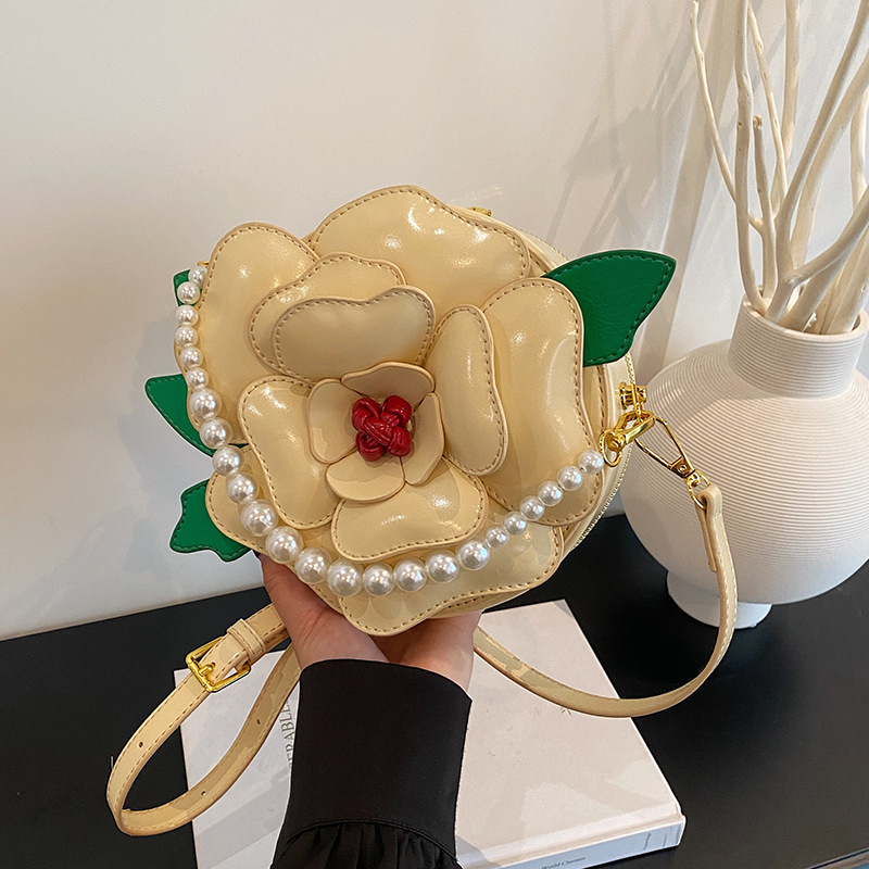 Cross border women's bag 2025 new summer fresh artistic flower dinner bag sweet and cute crossbody small round bag trend