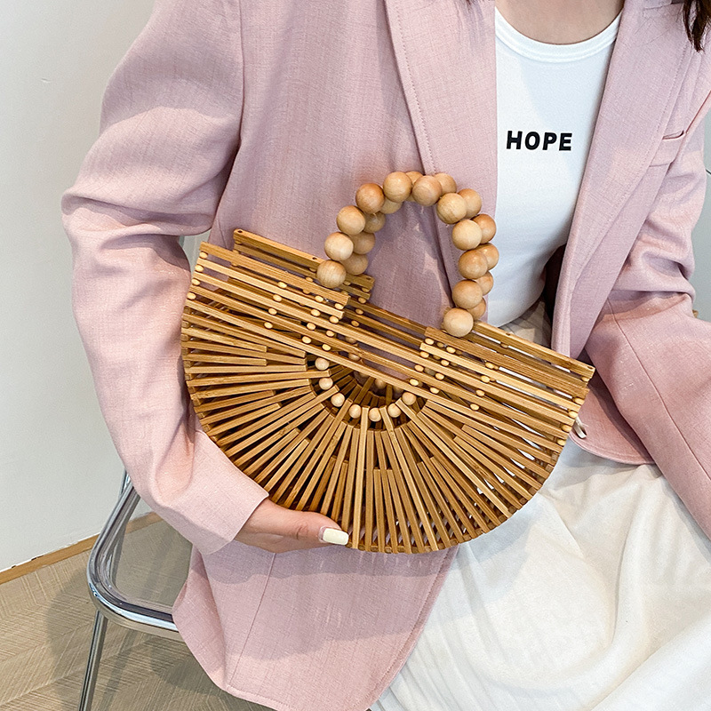 Internet celebrity summer woven bag 2025 forest style girl fashion hollow out large capacity pearl small fragrance handbag trend