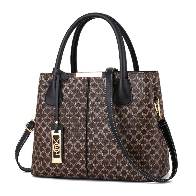 Simple retro printed handbag 2025 European and American fashionable women's bag large capacity shoulder crossbody bag for hair collection