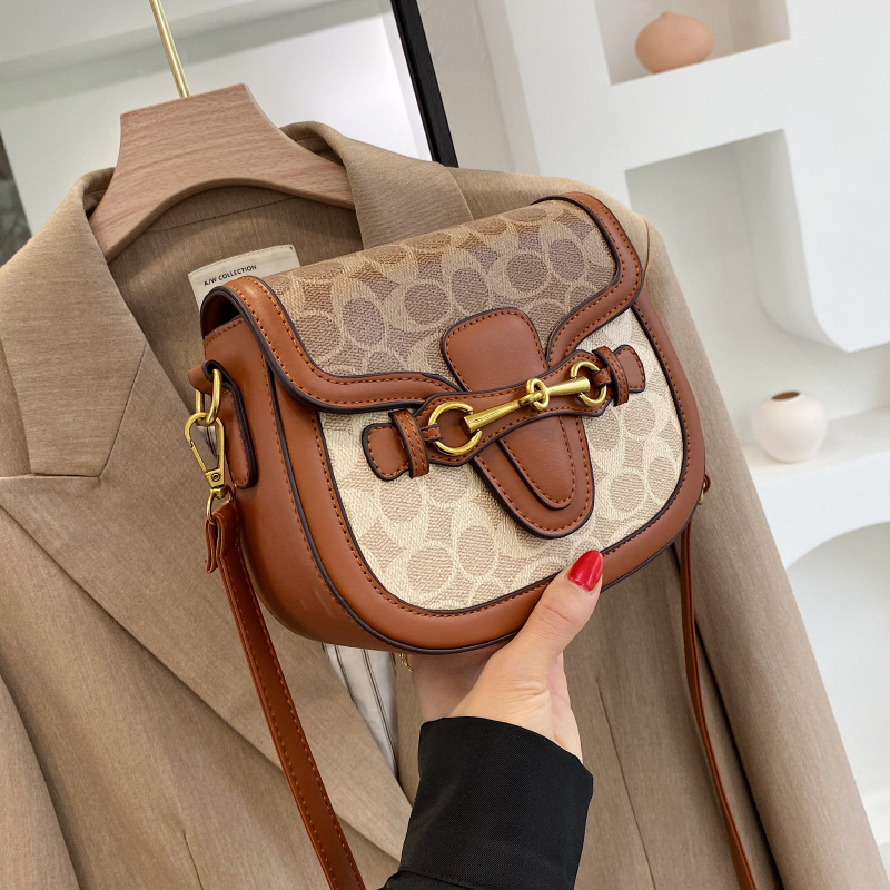 2025 handbag women's new high-end fashion retro crossbody bag Korean version western-style women's bag saddle bag broadband shoulder bag