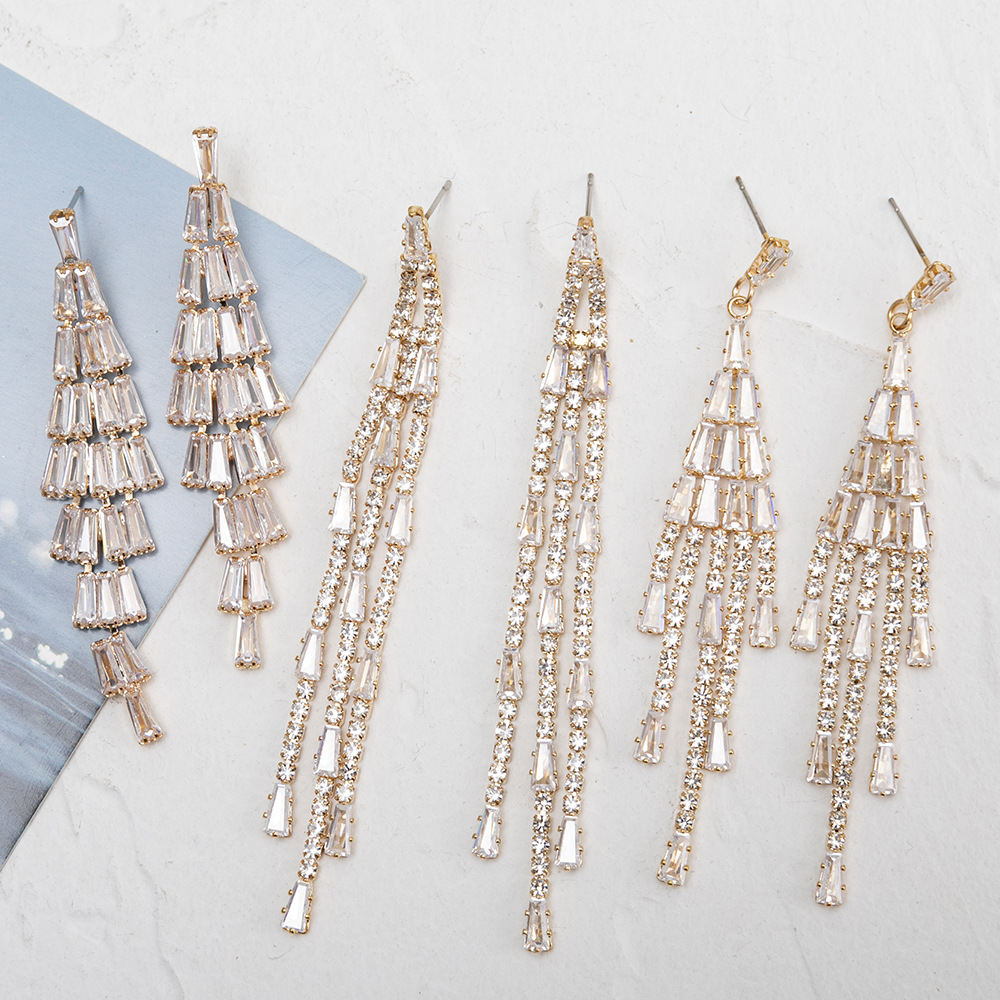 Manufacturer's Korean version simple all zircon trapezoidal hanging tassel rhinestone gold-plated claw chain earrings, hot selling wholesale