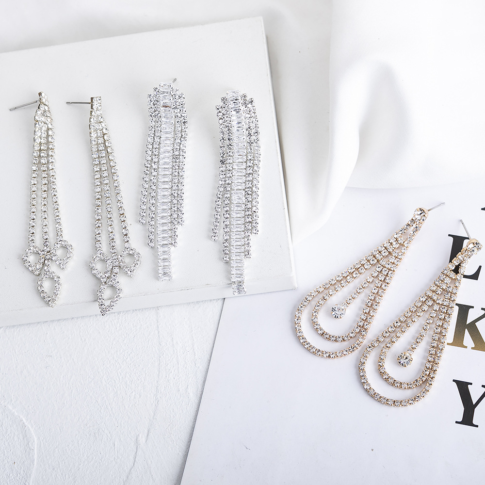 Light luxury temperament elegant droplet shaped Korean version gold-plated silver plated zircon tassel earrings cross-border rhinestone earrings