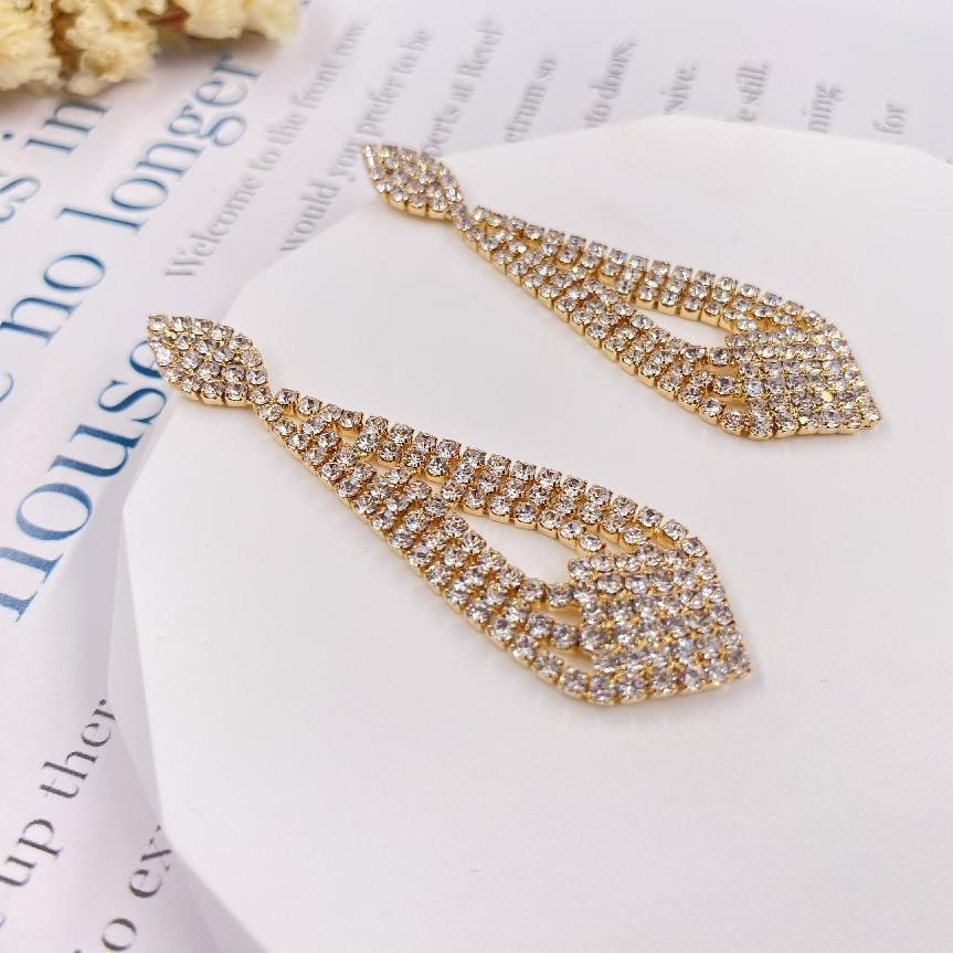 Minimalist European and American style fashionable water droplet shaped rhinestone hollow earrings for women's cross-border foreign trade earrings wholesale 2023