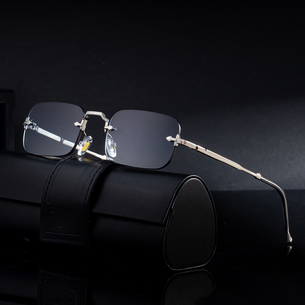 Frameless metal leg sunglasses for men, 2025 new European and American small frame sunglasses for women, trendy sunscreen cross-border glasses