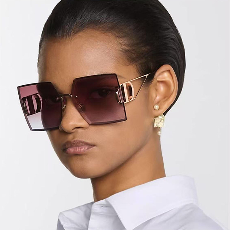 New European and American fashion diamond trimmed frameless sunglasses for women's fashion trend with hollowed out legs and large frame sunglasses for women's glasses