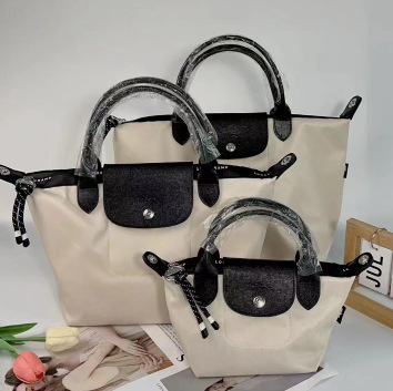 Longxiang bag Energy twill style short handle dumpling bag, hand-held single shoulder diagonal cross bag, travel bag, large capacity mommy bag Longxiang bag Energy twill style short handle dumpling bag, hand-held single shoulder diagonal cross bag, travel bag, large capacity mommy bag