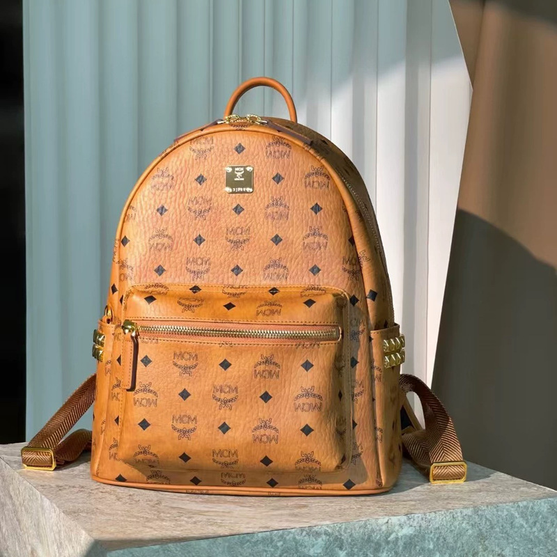 New 2025M home printed backpack for both men and women, classic high school student backpack with rivets, large capacity travel bag