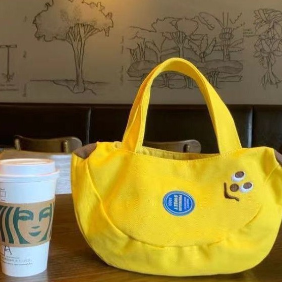 Cute and innovative banana bag with cartoon embroidery canvas bag for office workers, convenient handbag for moms to carry when going out