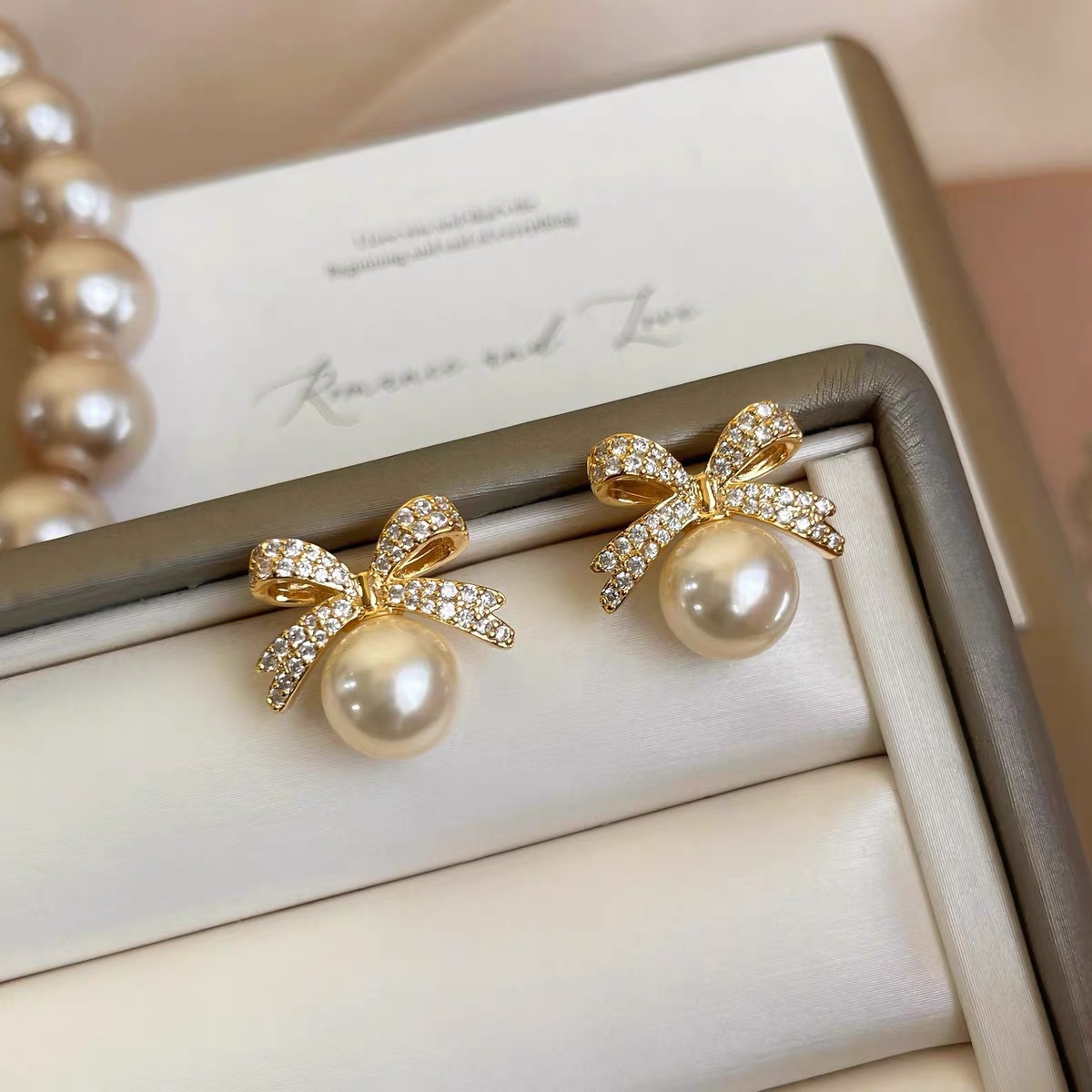 High end butterfly pearl earrings for women in 2025, popular new style, niche design, light luxury earrings, versatile temperament High end butterfly pearl earrings for women in 2025, popular new style, niche design, light luxury earrings, versatile temperament
