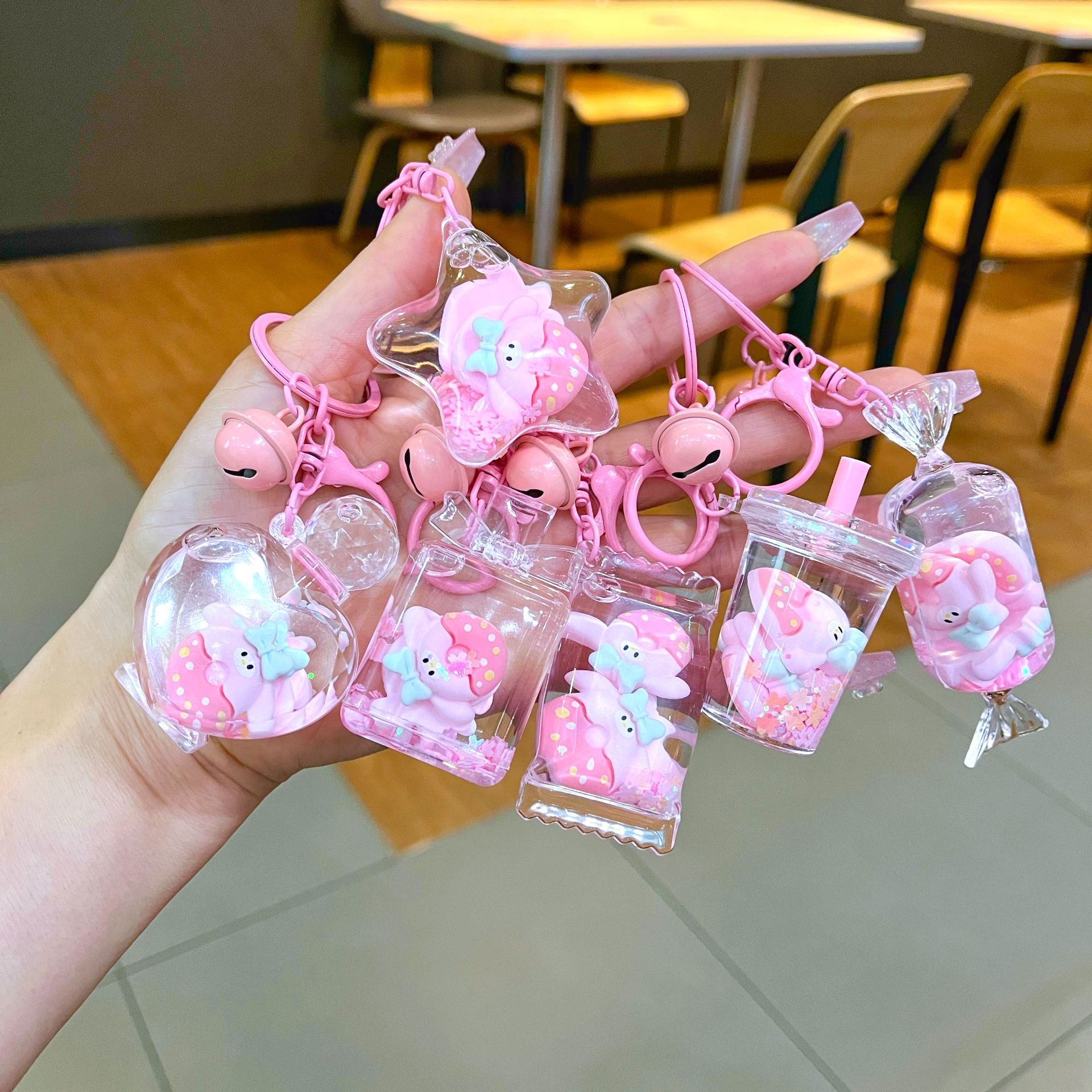 Oil filled luminous donut keychain pendant acrylic sand bottle backpack pendant wholesale festival gift wholesale