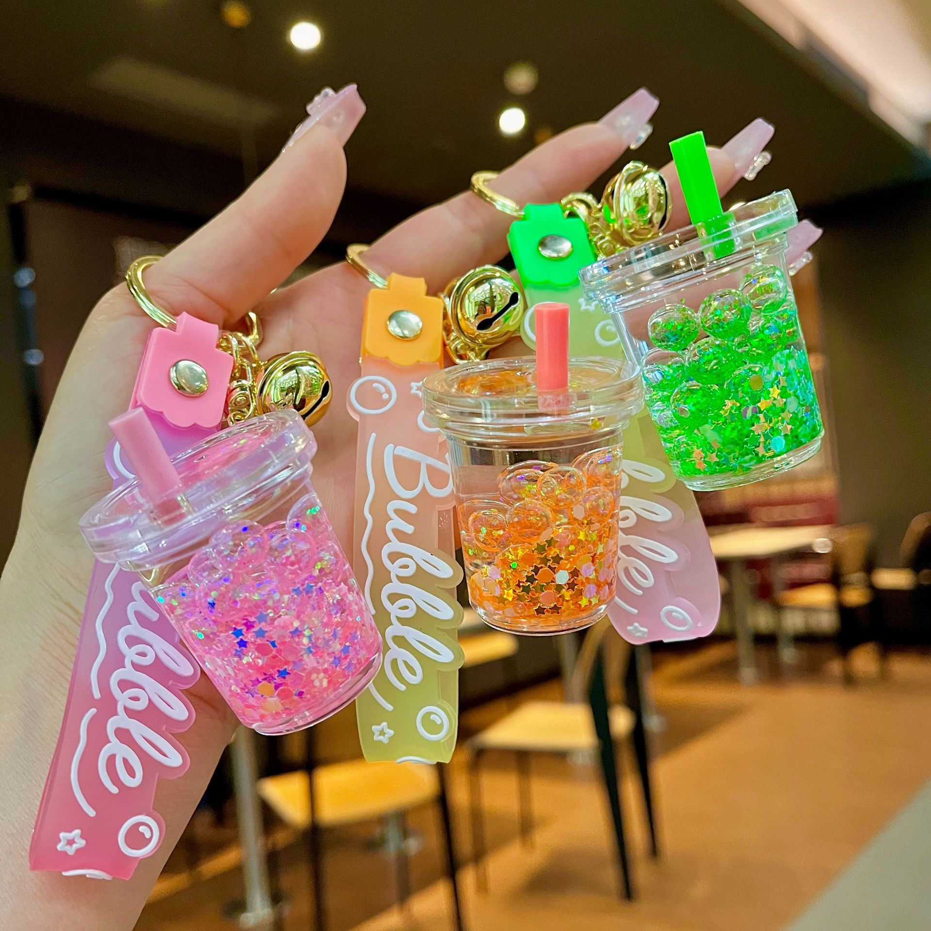Oil infused luminous bubble bead milk tea cup keychain, cute liquid quicksand pendant, backpack accessories, small gifts wholesale