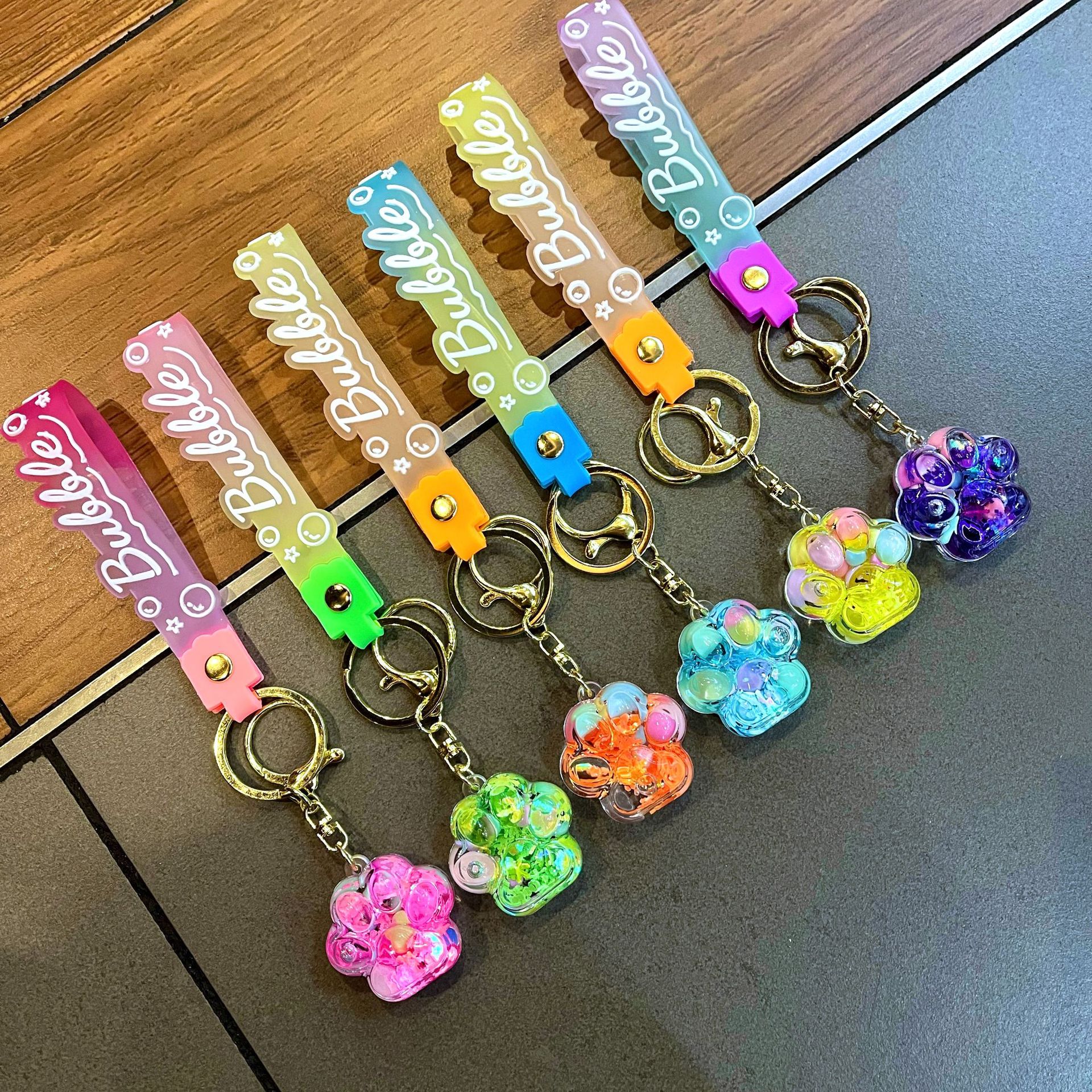 Luminous Cute Cat Claw Keychain in Oil Bottle Flowing Sand Claw Pendant Crystal Keychain Backpack Car Pendant