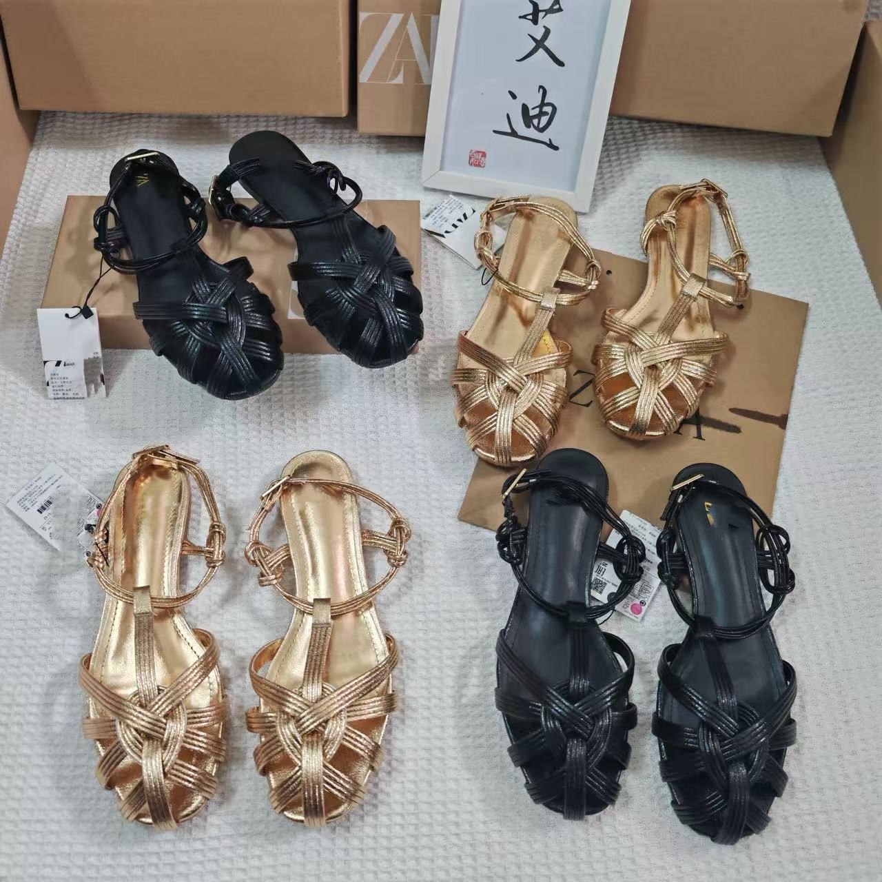 Spot factory wholesale ZA foreign trade original order unpacking flat shoes women's bag head hand woven Roman soft leather sandals women