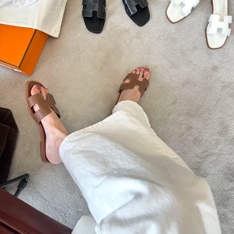 Cross border foreign trade one word slippers for women to wear outdoors in summer, with a vacation style and macaron colored palm prints, all inclusive flat bottom, and a cool mop