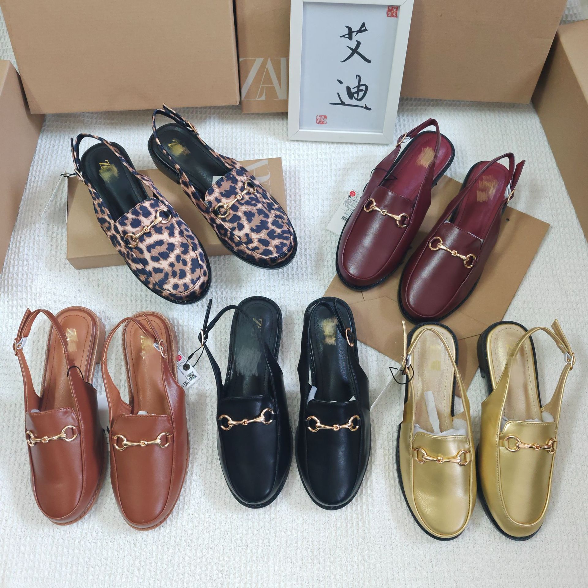 Eddie's popular foreign trade product, ZA home flat shoes, women's half bag with belt buckle, Le Fu shoes, one foot sandals, in stock