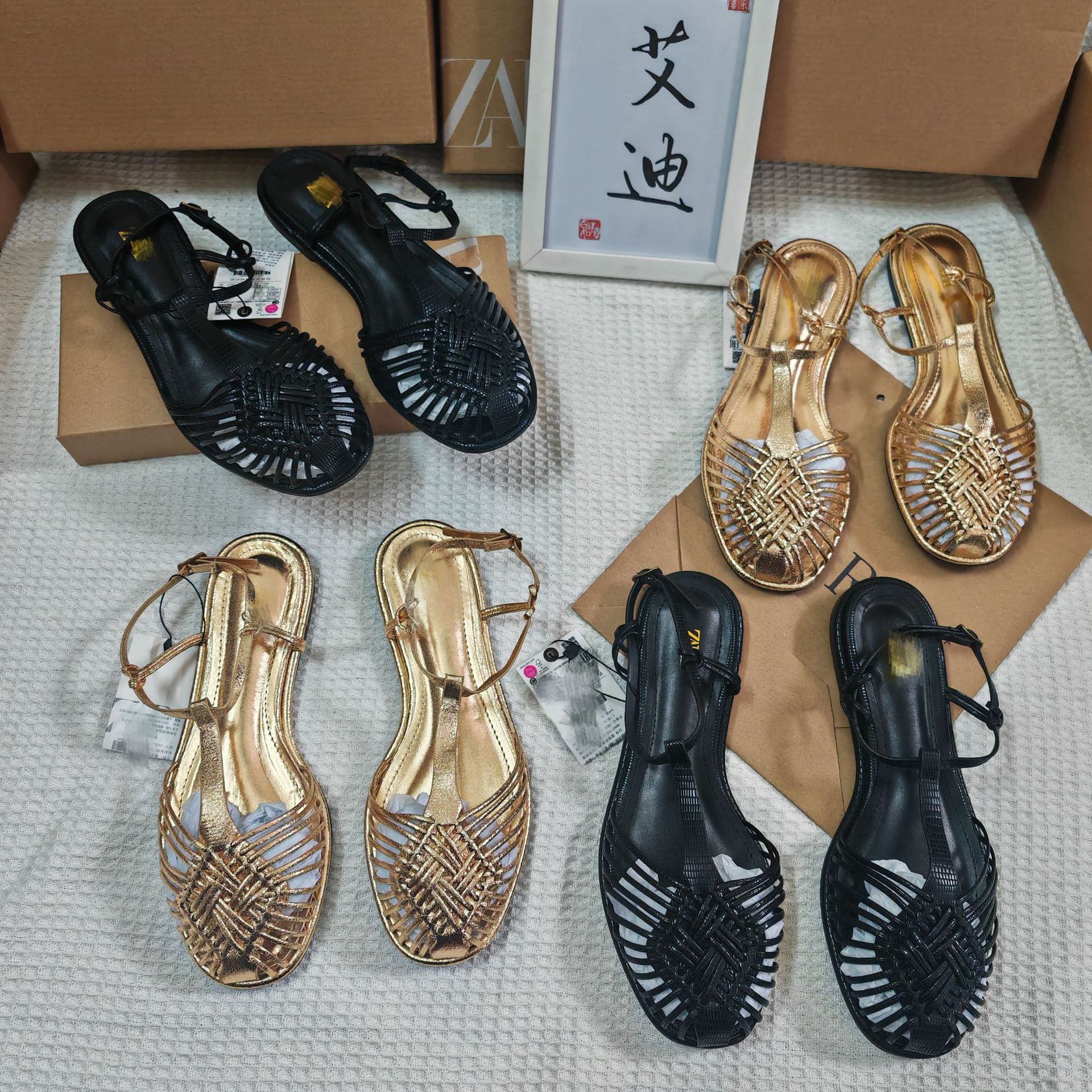 Spot foreign trade new hot item ZA home summer hand woven hollow Roman shoes toe cap one button flat sandals for women