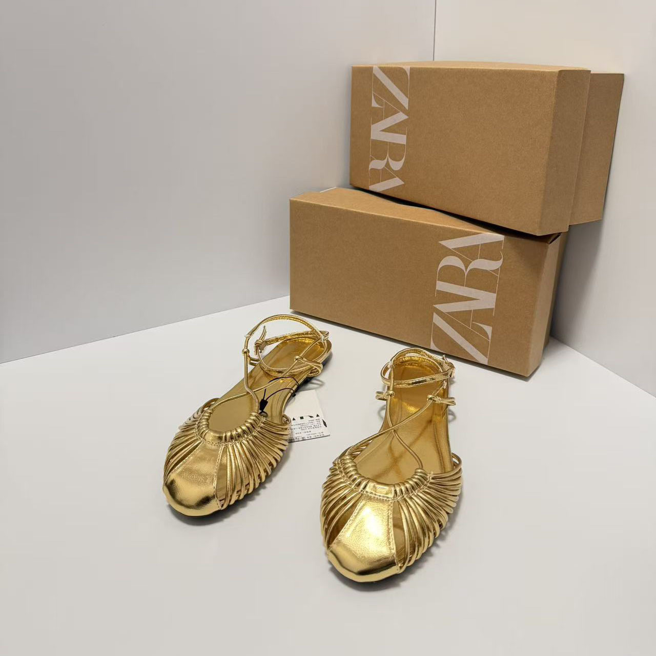 ZA2026 Spring New Product Hot selling Women's Shoes Gold Plated Metal Layer Effect Hollow Round Head Foot Backpack Belt Sandals