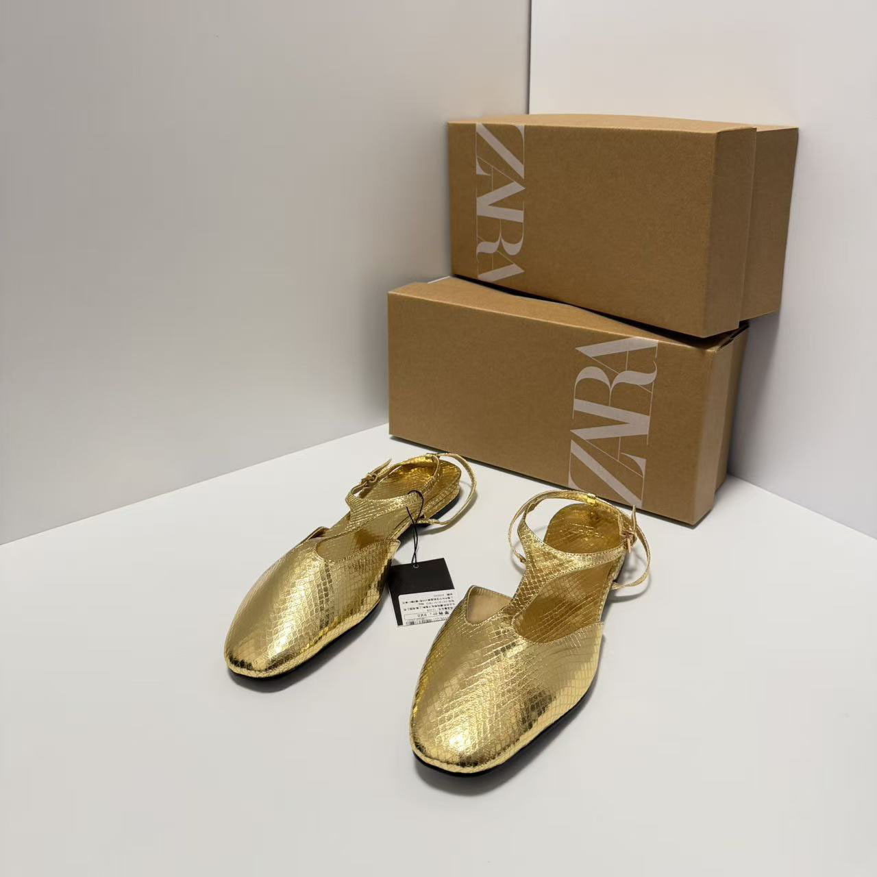 ZA manufacturer's spot cross-border popular gold Baotou fashion flat sandals women's shallow mouth hollow back strap shoes wholesale