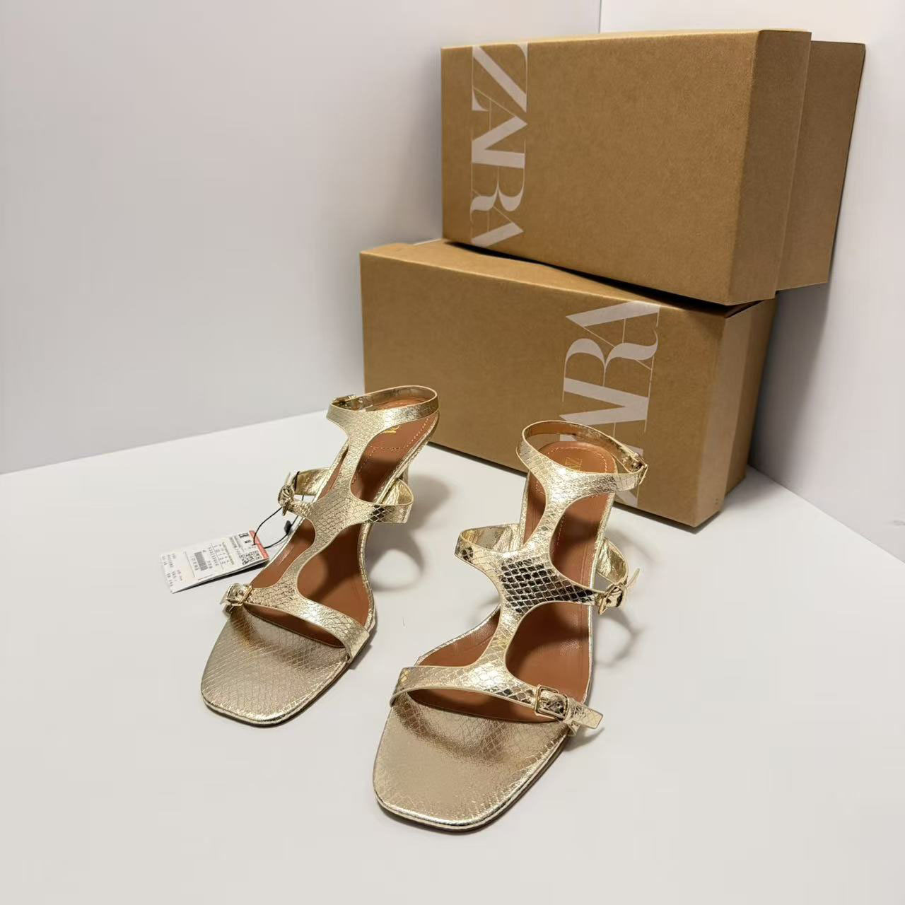 ZA2025 New Spanish Gold Women's Shoes Fashion Shallow Mouth Leakage Finger Back Strap Thin Heel Strap High Heel Sandals