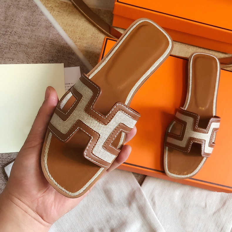 Flat bottomed one-piece sandals for women's 2023 spring and summer new travel vacation color blocked beach slippers