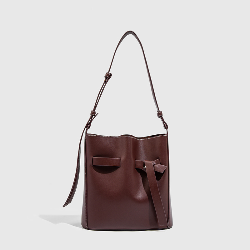 Cross border women's handbag, knot decoration, thread cutting, large capacity, portable, niche, simple, single shoulder, crossbody, bucket bag, tote bag for foreign trade