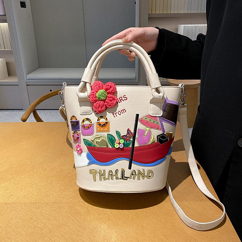 Foreign Trade Bag Women 2026 Cross border New Creative Embroidery High quality Shoulder Cross body Bag Retro Handheld Bucket Bag