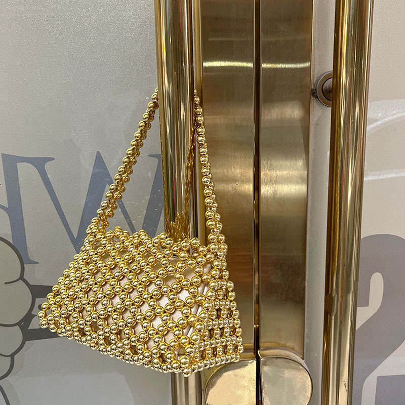 Cross border trend in Europe and America, hollowed out sparkling crystal handmade bead woven bag, hand-held armpit, single shoulder, crossbody bag