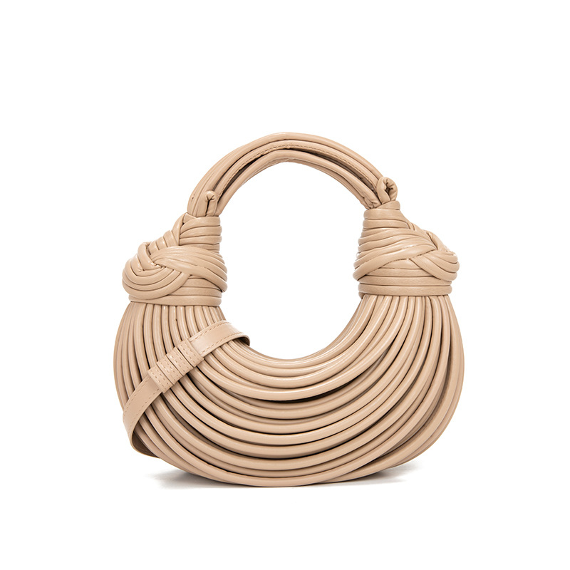 Cross border handmade woven PU hand-held crescent shaped women's bag knotted noodle bag, hand-held crossbody cloud armpit bag wholesale