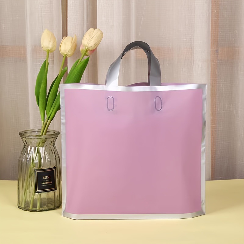 Cross border gift bags, shopping bags, new hand-held clothing, plastic makeup bags for women's clothing, children's clothing bags, shoe washing bags Cross border gift bags, shopping bags, new hand-held clothing, plastic makeup bags for women's clothing, children's clothing bags, shoe washing bags