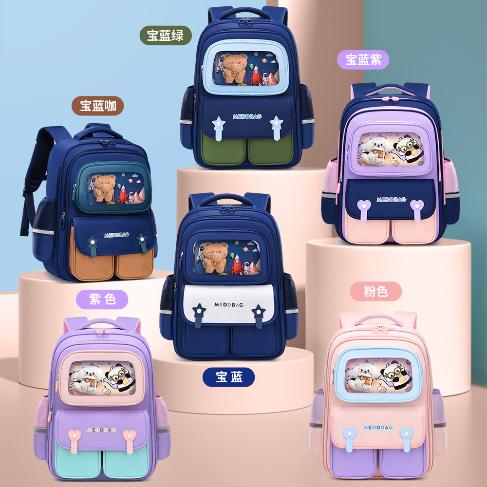 Primary school students' backpacks for boys and girls in grades one, two, and six, spinal protection and weight reduction, lightweight and large capacity waterproof backpacks