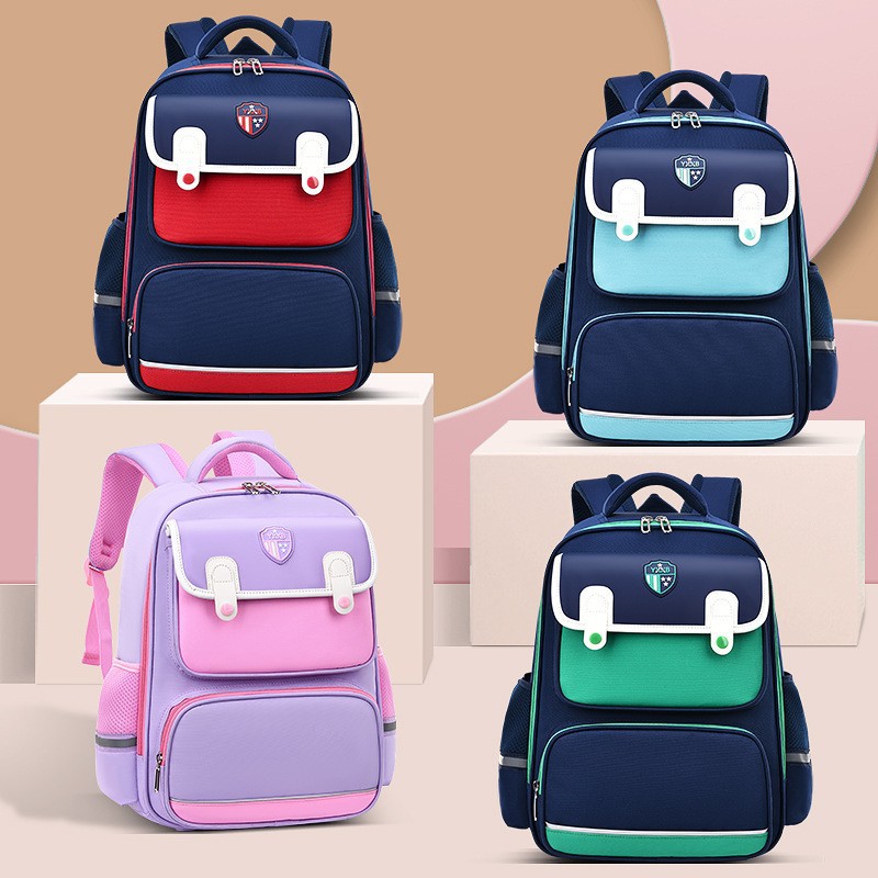 New British style children's backpack with spine protection and reduced burden for elementary school students, multi compartment large capacity backpack wholesale