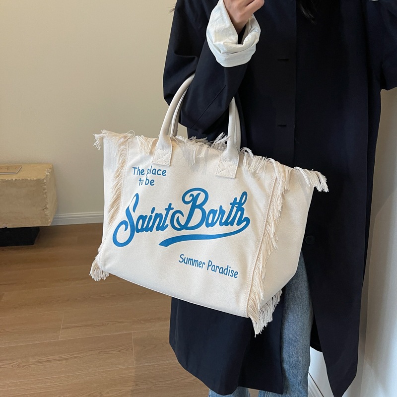 Cross border European and American handmade tassel beach canvas bag for women, 2026 new printed tote bag, large capacity shoulder bag Cross border European and American handmade tassel beach canvas bag for women, 2026 new printed tote bag, large capacity shoulder bag