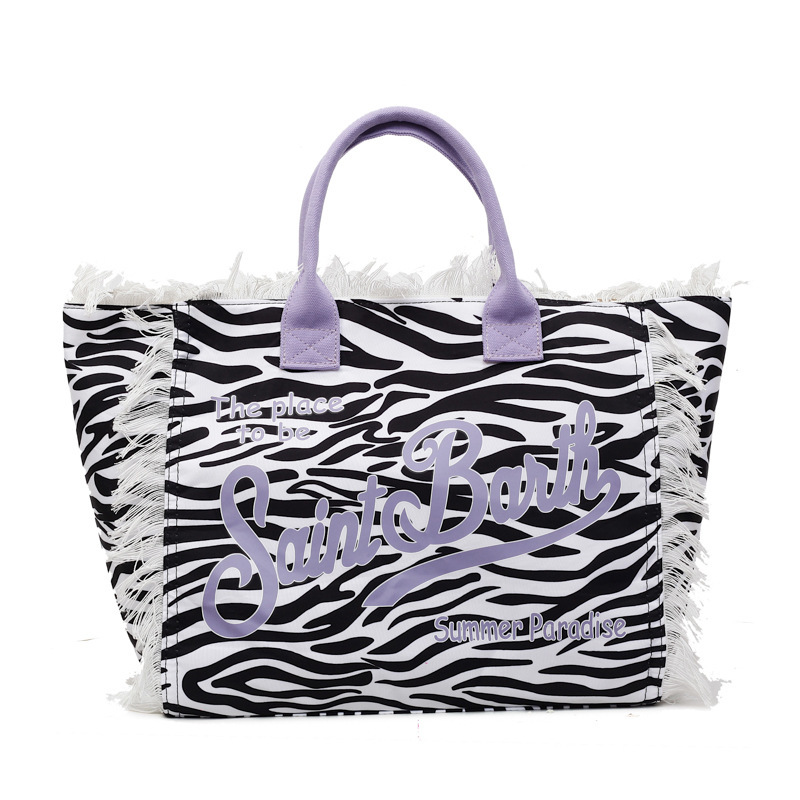 Cross border European and American handmade tassel beach canvas bag for women, 2026 new printed tote bag, large capacity shoulder bag Cross border European and American handmade tassel beach canvas bag for women, 2026 new printed tote bag, large capacity shoulder bag