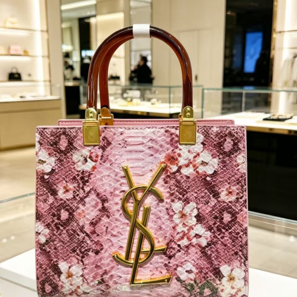 Tote bag large capacity women's 2026 new genuine leather light luxury niche high-end feeling commuting hand-held shoulder crossbody bag