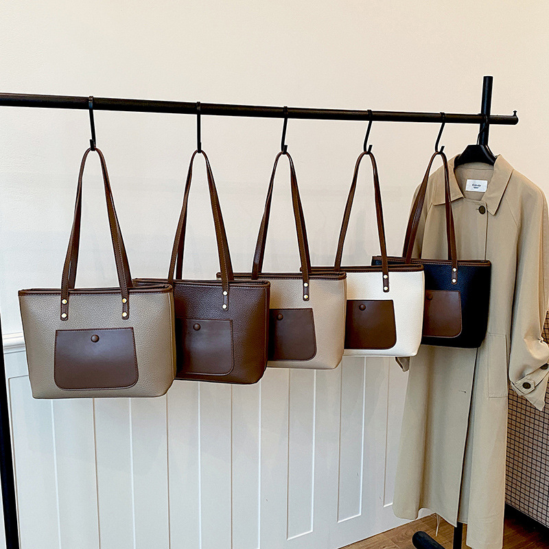 Large capacity commuting bag, armpit bag, women's 2026 autumn new style stylish tote bag, niche single shoulder bag