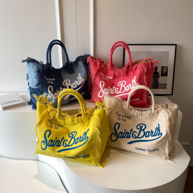 Women's bag niche design Korean letter embroidery tassel canvas large capacity simple commuting student single shoulder tote bag