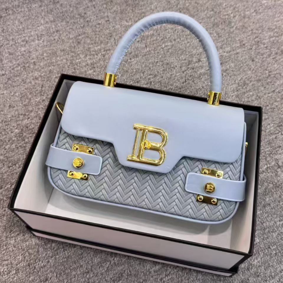 Cross border high-end design women's bag 2026 new casual commuting practical versatile hand-held shoulder crossbody bag Cross border high-end design women's bag 2026 new casual commuting practical versatile hand-held shoulder crossbody bag