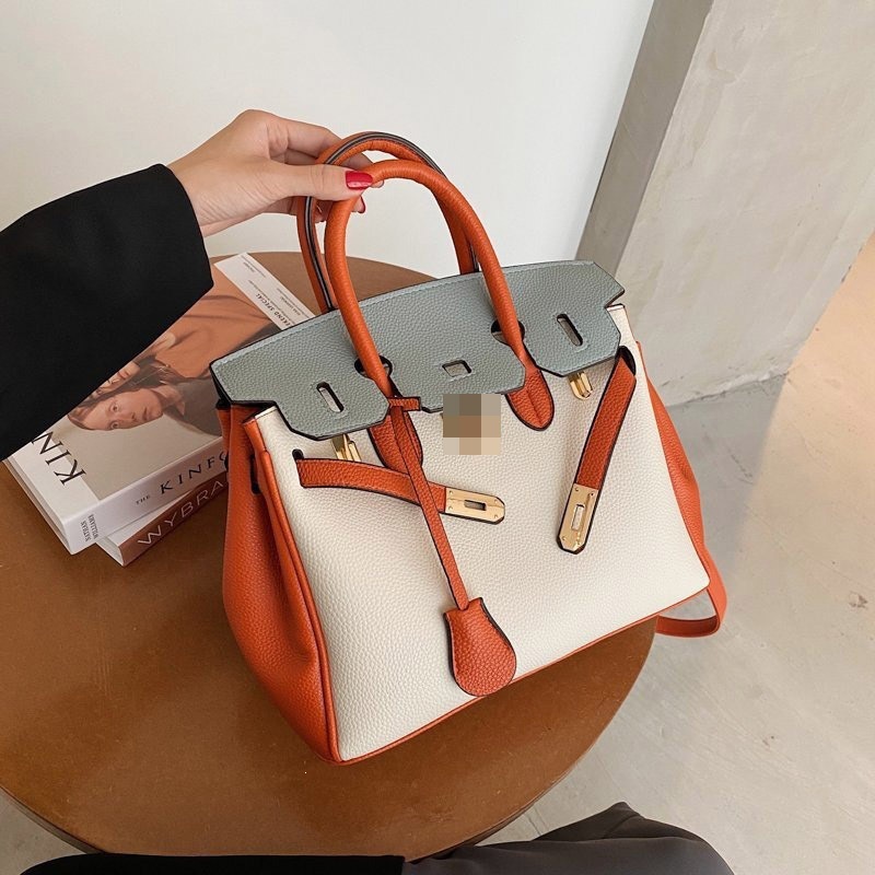 Foreign trade handbag crossbody 2026 new high-end feeling lychee pattern contrasting color single shoulder platinum Kelly bag tote bag wholesale