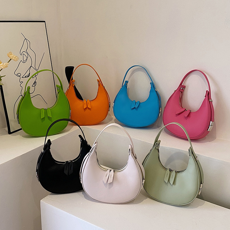 Korean version solid color simple underarm bag for women's foreign trade, new niche shoulder bag, stylish and versatile, hand-held crescent dumpling bag