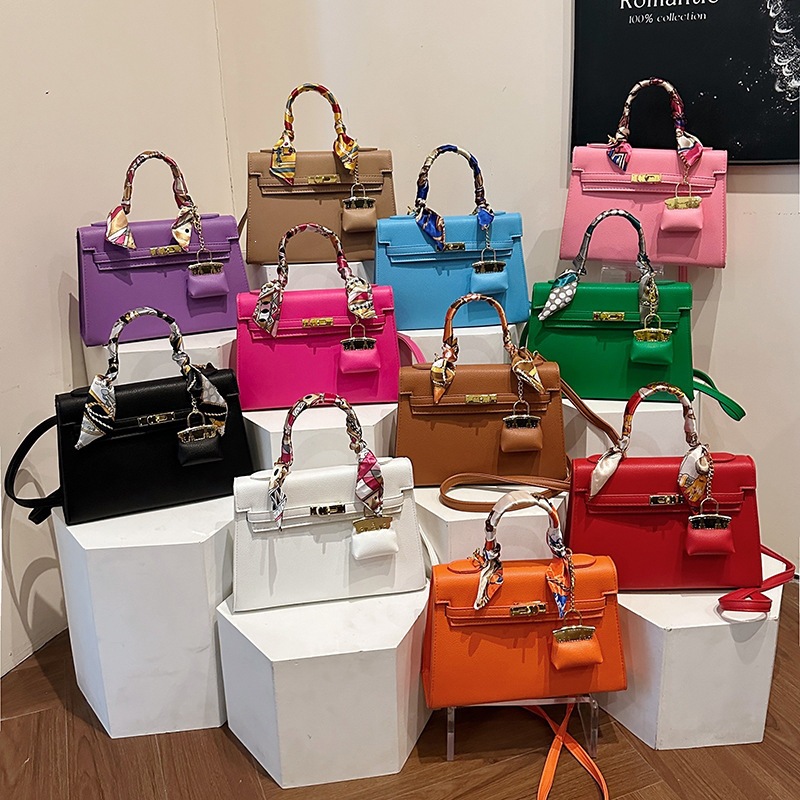 Cross border hand-held Kelly bag for women 2026 new style, light luxury and high-end, large capacity scarf pendant, single shoulder crossbody bag