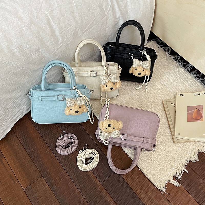 Simple solid color hand-held small bag for women 2026 new niche design texture shoulder bag casual personalized crossbody bag