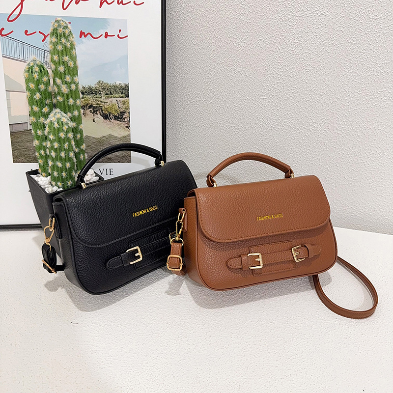 Cross border 2026 new Korean version simple and fashionable shoulder bag, women's retro leisure large capacity crossbody saddle bag trend