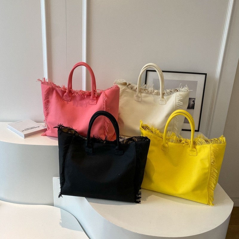 Cross border 2026 New Fashionable Beach Large Capacity Handheld Shoulder Bag Handmade Tassel Printed Commuter Tote Bag Batch