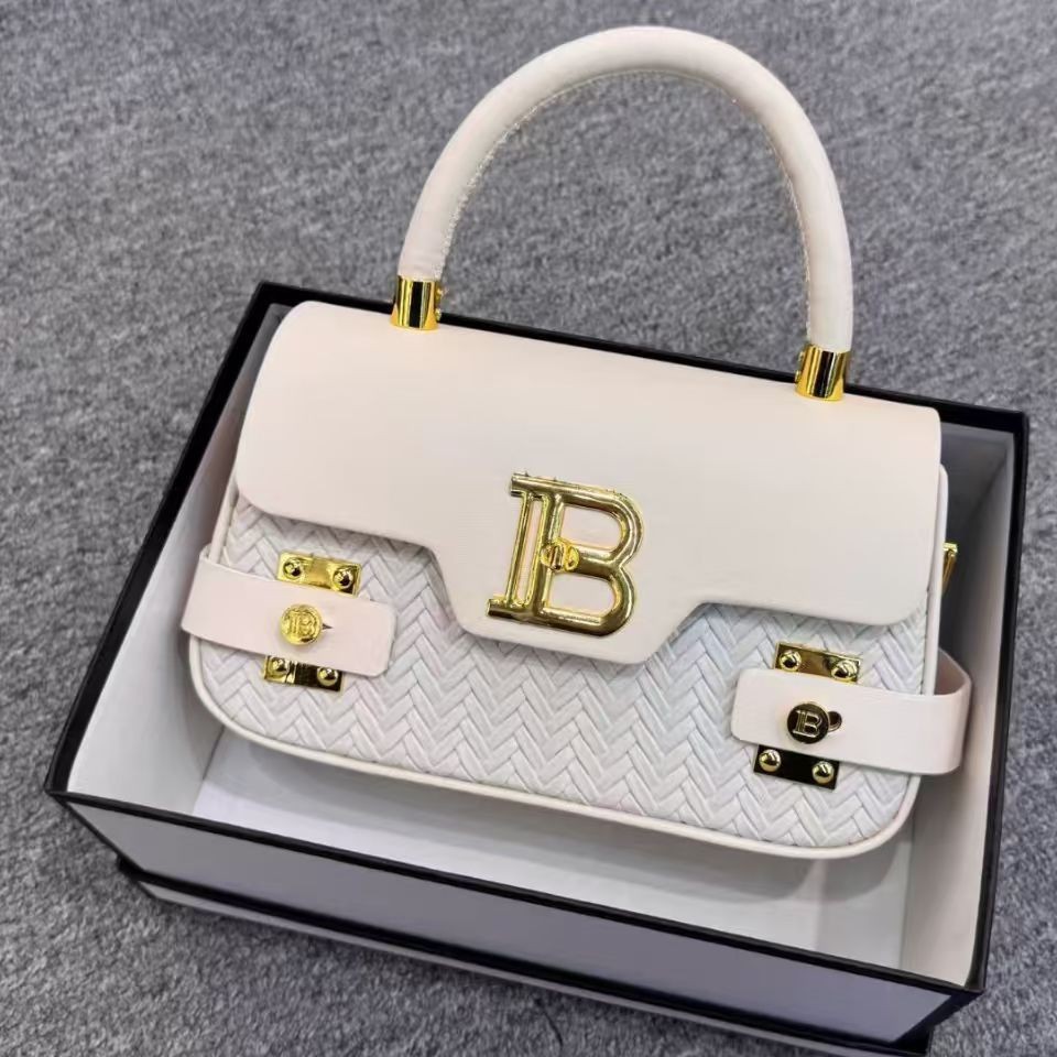 Cross border high-end design women's bag 2026 new casual commuting practical versatile hand-held shoulder crossbody bag Cross border high-end design women's bag 2026 new casual commuting practical versatile hand-held shoulder crossbody bag