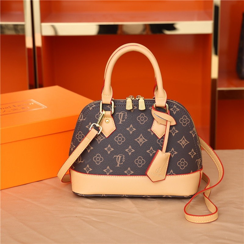 Cross border European and American retro printed hand-held women's bag 2026 new simple and fashionable single shoulder crossbody bag, stylish shell bag