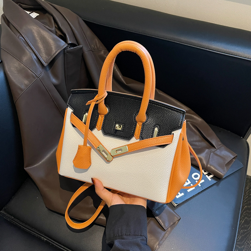 Cross border fashion texture hand-held Kelly bag for women, 2026 new autumn fashion trend, large capacity single shoulder crossbody bag