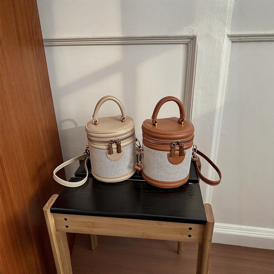 Bags2026 new color blocked cylindrical bucket bag for women, carrying crossbody bag, fashionable color blocking woven single shoulder small bag